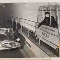 B+W photo of new catwalk car during test in Holland Tunnel, Dec. 20, 1954.