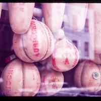 Color slide of Italian cheese in a window.