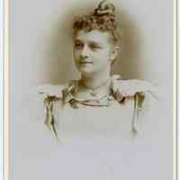 Cabinet photo of a young woman posed in photographer