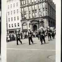 Digital image of b+w photo of Champion Fife & Drum Corp marching east on Newark at Washington St., Memorial Day, Hoboken, May 30,1950.