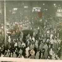 Color copy photo of a B& W photo of a crowd on Washington Street on Election Night, Hoboken, May, 1947.