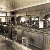 Sepia-tone photo of interior of Clam Broth House lounge (bar), 30 Newark St., Hoboken, no date, circa 1950.