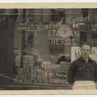 B&W photo of John Schisano in front of Central Market, 161 14th St., Hoboken, n.d., ca. late 1940s or 1950s