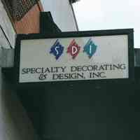 Color photo of the sign of Specialty Decorating & Design, Inc., Building A, corner of 800 Jackson St., Hoboken, Jan. 3 & 4, 2002.