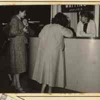          5, right column, top: women at hand writing analysis booth
   