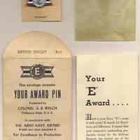          pin with original glassine sleeve, envelope, information folder
   