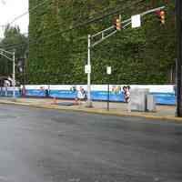 Digital color image of the Maxwell House Coffee plant site with printed vinyl fence sign banners, Hoboken, October 2004.