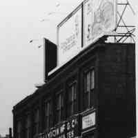          detail 1, upper left: rooftop billboards; painted sign on building
   