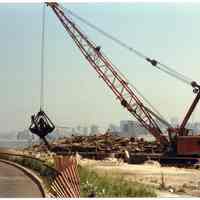 Color photos, 2, of demolition of old pier, Hudson River & River Road near 6th to 7th Sts., Hoboken, May 1985.