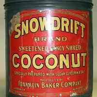 Can: Snowdrift Brand Sweetened Fancy Shred Coconut. (25 lbs.) Made by Franklin Baker Co. Hoboken, n.d., ca. 1920s.