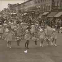 Digital image of B+W negative image of a Hoboken Playgrounds girls marching unit on Washington St., Hoboken, no date, circa 1938-1940.