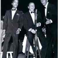 B+W repro photo of Sammy Davis, Jr., Frank Sinatra & Dean Martin performing onstage during a tour, n.p., n.d. (ca. 1960-1965.)