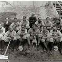 B+W of the Stevens School baseball team in uniform with mascot near Castle Point steps, Hoboken, no date, ca. 1900-1915.