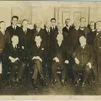 Sepia-tone group photo of men at the German Seamen