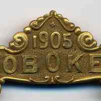          detail pin bar, top element: Hoboken 1905
   