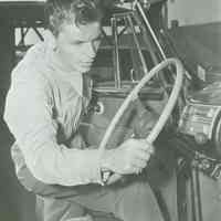 B+W reproduction photo of Frank Sinatra getting into a car, no place, no date, ca. 1950.