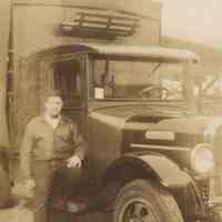 Digital image of sepia-tone photograph of Carmine Gallo with truck belonging to Hatfield Brothers, Hoboken, no date, ca. 1930