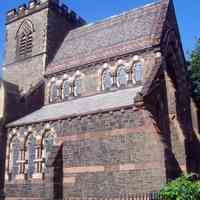          8: Partial SW veiw of east facade; lateral view of buttresses.
   