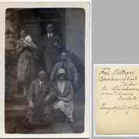          46: loose photo: two women & two men in dog posed on outside stairs
   