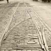          detail center: streetcar rail and frog (switch) for a former turnout
   