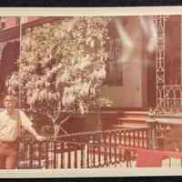 Photo of a man and child in front of 68 10th Street