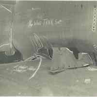 B+W photo of interior view of structural damage #4 wing tank starboard in an unidentified vessel at the Bethlehem Steel Shipyard, no date, ca. 1940.