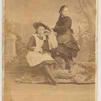 Carte-de-visite of 2 girls in a rustic pose, Hoboken, 1881.