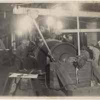 B+W photo of men working on turbine rotor at Bethlehem Steel Shipyard, Hoboken, n.d., ca. 1940-1945.