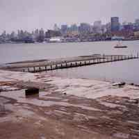 Color photo of an elevated view of the remains of a pier on the Hudson River at 4th Street, Hoboken, 1999.