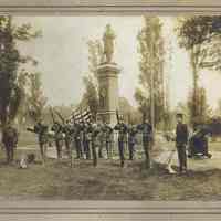 Sepia-tone photo of military ceremony at Civil War Soldiers Monument, Hudson Square Park, Hoboken, n.d., probably May 1905.