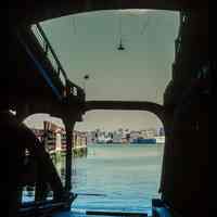 Color slide of eye-level view of the Hudson River and New York City looking E from inside the Lackawanna Terminal