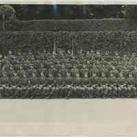 B+W group photo of an Army infantry company, no place, no date. Appears to be from World War II.