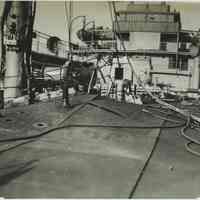 B+W photo showing damage on the main deck on unidentified vessel at the Bethlehem Steel Shipyard, Hoboken Division, no date, ca. 1940.