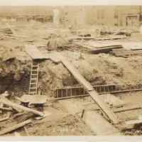 Sepia-tone photo of close-up of poured foundations for the Fabian Theatre, southeast corner of Newark & Washington Sts., Hoboken, Dec. 3,1927.