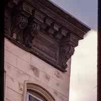 Color slide of detail view of cornice, brackets and frieze on an unidentified building at Hudson and 2nd