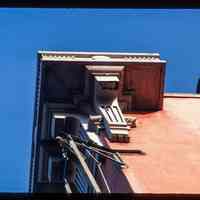          Color slide of detail view of cornice, brackets and fire escape at 155 6th between Bloomfield and Garden picture number 1
   