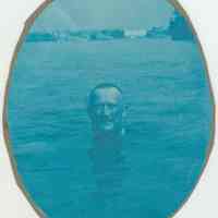 Oval cyanotype photo of a member of the Atlantic Boat Club swimming in the Hudson River, Hoboken, no date, ca. 1890.