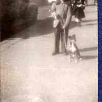 Digital image of B+W photo of Ken Schultz ca. 4-5 years old, with a dog, Hoboken, no date. ca. 1945.