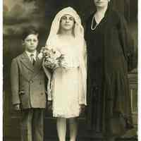 Sepia-tone photos, 4, various subjects posed in studio with interior backdrop, Hoboken, n.d., ca. 1926-1935.