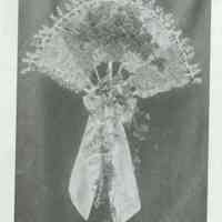 Lantern slide (missing), color?, of a corsage, used for promotional display in Hoboken, no date, ca. 1920.