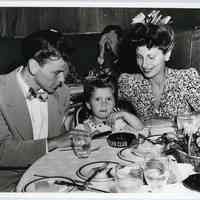 B+W photo of Frank Sinatra, wife Nancy & daughter Nancy at Stork Club, N.Y., n.d., ca. 1946-1947.