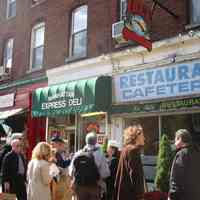 Digital copy of color photo of food tour members outside La Isla Restaurant, 104 Washington St., Hoboken, Oct. 18, 2003.