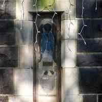          17: detail baptistery, front view of narrow (lancet) window; stained glass
   