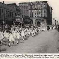 Decoration (Memorial) Day Parade near the Fabian Theatre, on Newark St., east of Washington St., Hoboken, May 31, 1938.