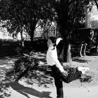 B+W photo of girl dancer rehearsing offstage at Humanities Festival Week activities, Church Square Park, Hoboken, October, 1999.