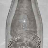 Bottle, milk: The Peerless Dairy. Hoboken, N.J. One Pint. N.d., ca. 1904-1924.