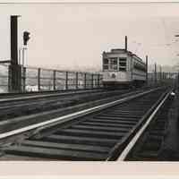 B+W photo of trolley car 2740 on trestle approaching Jersey City Heights on last full day of use, Hoboken, Aug. 6, 1949.