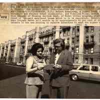 B+W photo of Robert Armstrong & Vidalina Milan on Washington St. discussing Elysian Apartment rehabilitation, Hoboken, Sept. 11, 1972.