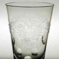          detail 1 front: Pilsner Beer with double eagle crest
   