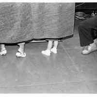 B+W photo of a woman and child in a voting book on election day, Hoboken, [June 11, 1985].